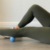 Picture of person massaging calf muscle with massage ball